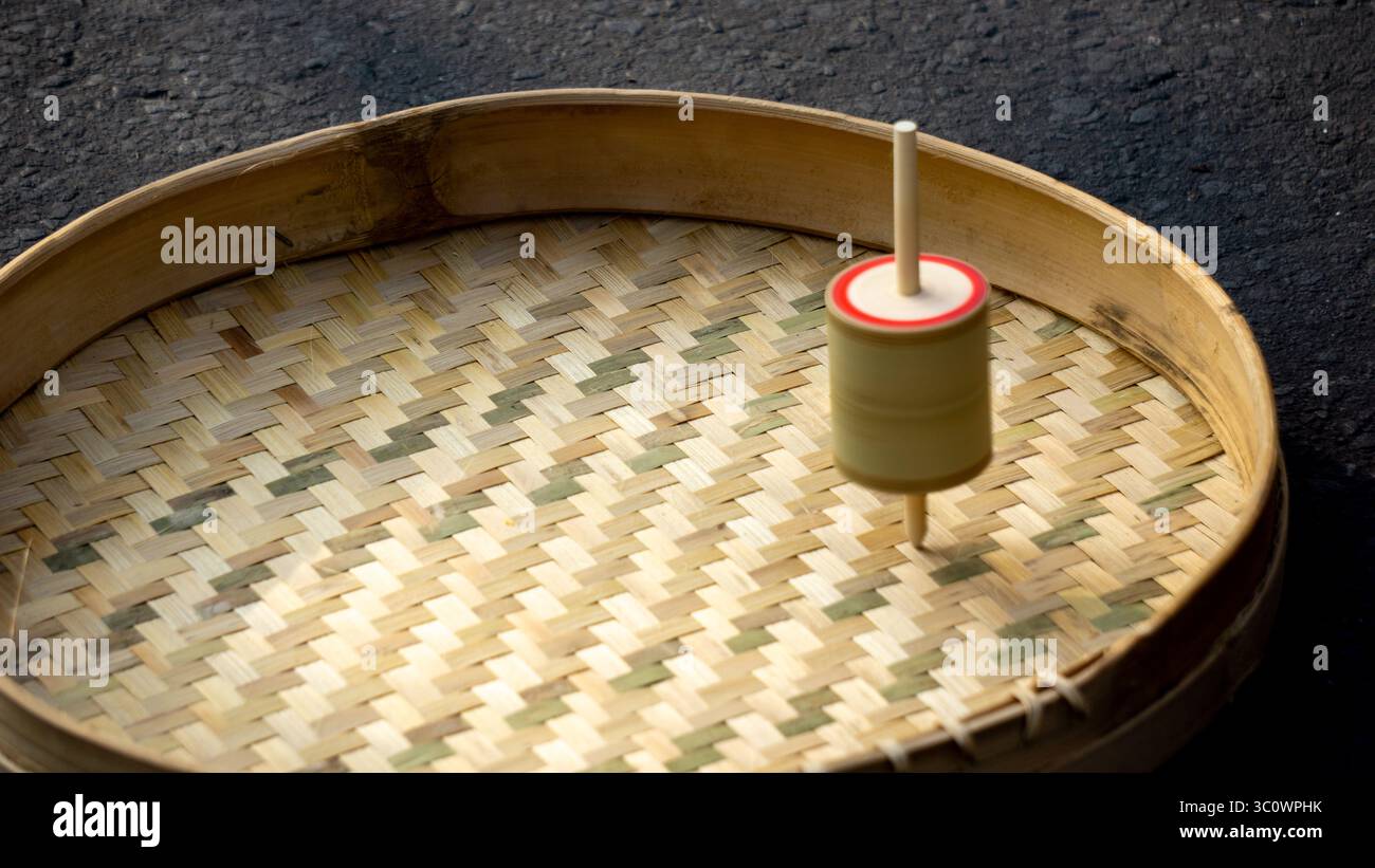 Model a spinning top, made of bamboo and wood wrapped with rope Stock ...