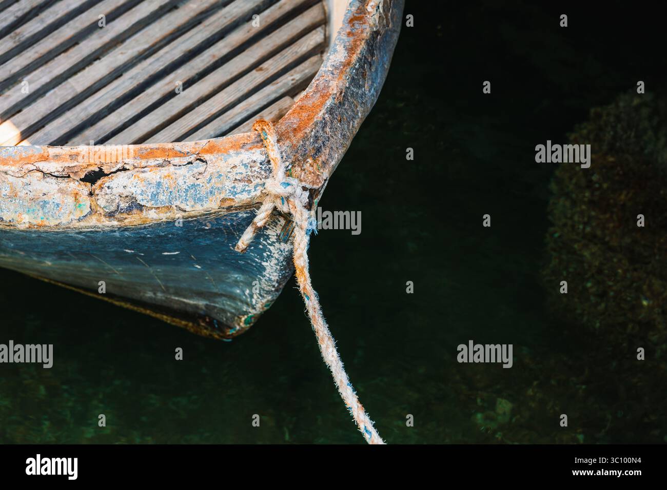 Damaged boat tied up to dock hi-res stock photography and images - Alamy