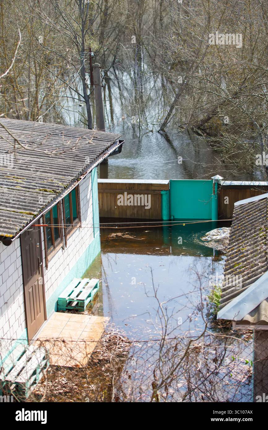 Spring flood. Flooded house from the plots due to the spring river ...
