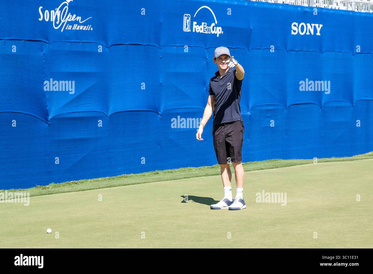 January 9, 2019 - Honolulu, Hawaii: Tom Holland who plays the role of Spider Man in the Avengers movie points to fans on the 18th hole green during the Pro/Am day before the Sony Open at Waialae Country Club in Honolulu, Hawaii. Glenn Yoza/CSM(Credit Image: &copy; Glenn Yoza/CSM via ZUMA Wire) Stock Photo