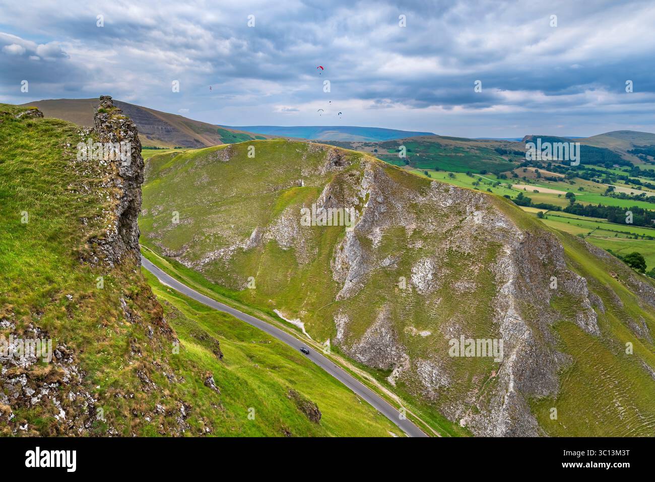 The spectacular limestone gorge of Winnats Pass, with the road and ...