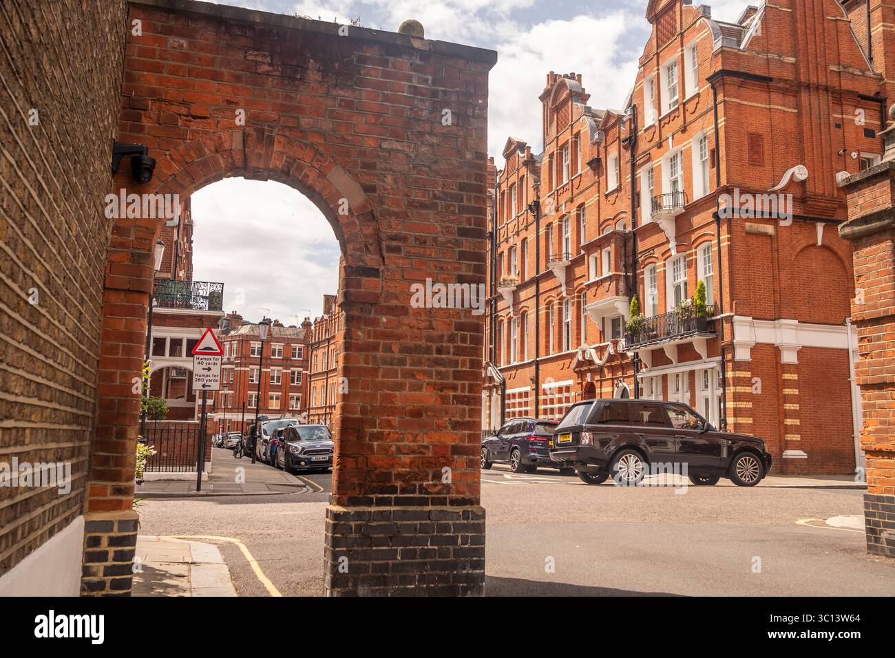 LONDON- JULY 15, 2025: Red brick mansion buildings in the prestigious neighbourhood around Egerton Gardens in South Kensington Knightsbridge area Stock Photo