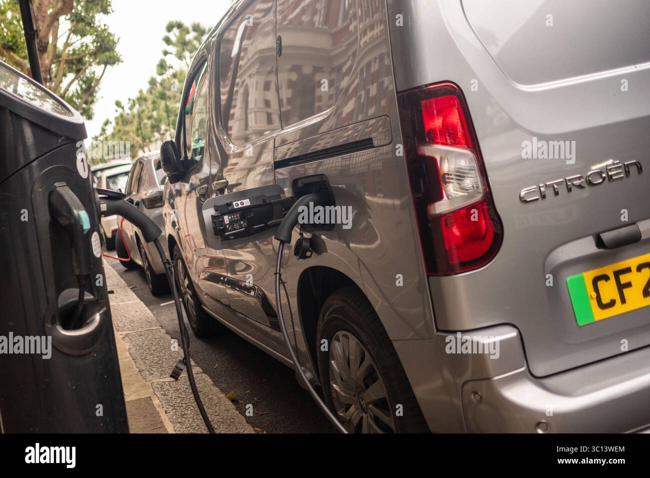 LONDON- JULY 15, 2025: A Citroen Electric van on charge on a city street Stock Photo