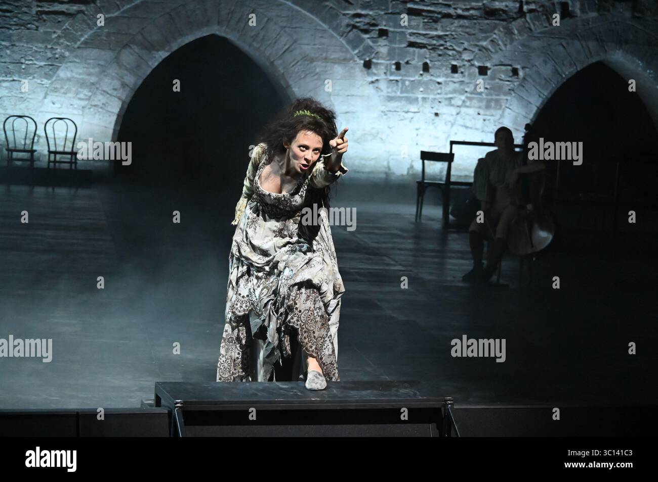 Festival d'Avignon IN 2025 'Le soulier de satin' ('The Satin Slipper'), play by Paul Claudel directed by Eric Ruf, performed in the Courtyard of the Palais des Papes on 19 July 2025  Costumes by Christian Lacroix    With the troupe of the Comédie-Française  Alain Lenglet, Florence Viala, Coraly Zahonero, Laurent Stocker, Christian Gonon, Serge Bagdassarian, Suliane Brahim, Didier Sandre, Christophe Montenez, Marina Hands, Danièle Lebrun, Birane Ba, Sefa Yeboah, Baptiste Chabauty, Edith Proust and Fanny Barthod, Rachel Collignon, Gabriel Draper et Vincent Leterme, Aurélia Bonaque Ferrat, Ingrid Stock Photo