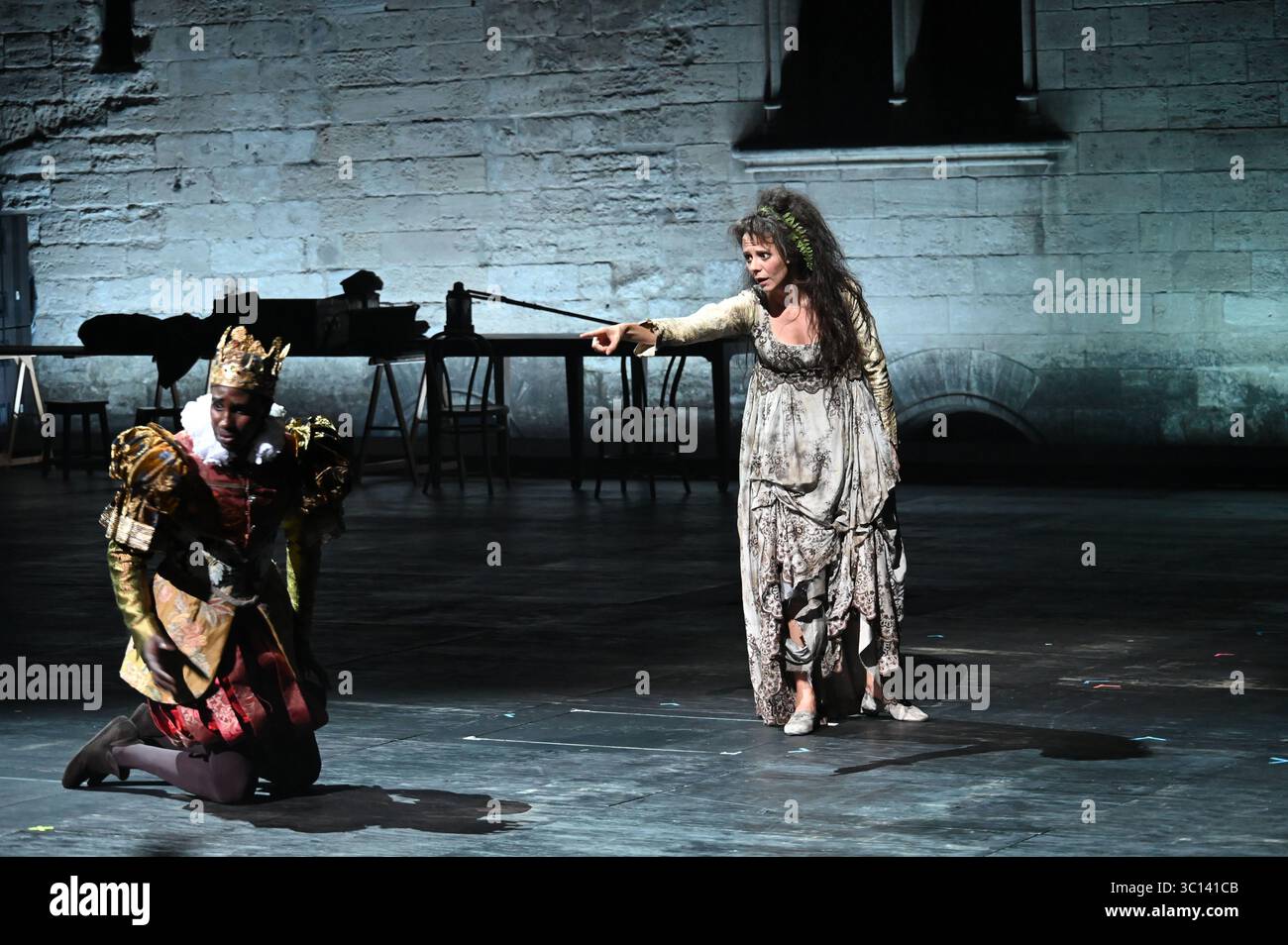 Festival d'Avignon IN 2025 'Le soulier de satin' ('The Satin Slipper'), play by Paul Claudel directed by Eric Ruf, performed in the Courtyard of the Palais des Papes on 19 July 2025  Costumes by Christian Lacroix    With the troupe of the Comédie-Française  Alain Lenglet, Florence Viala, Coraly Zahonero, Laurent Stocker, Christian Gonon, Serge Bagdassarian, Suliane Brahim, Didier Sandre, Christophe Montenez, Marina Hands, Danièle Lebrun, Birane Ba, Sefa Yeboah, Baptiste Chabauty, Edith Proust and Fanny Barthod, Rachel Collignon, Gabriel Draper et Vincent Leterme, Aurélia Bonaque Ferrat, Ingrid Stock Photo