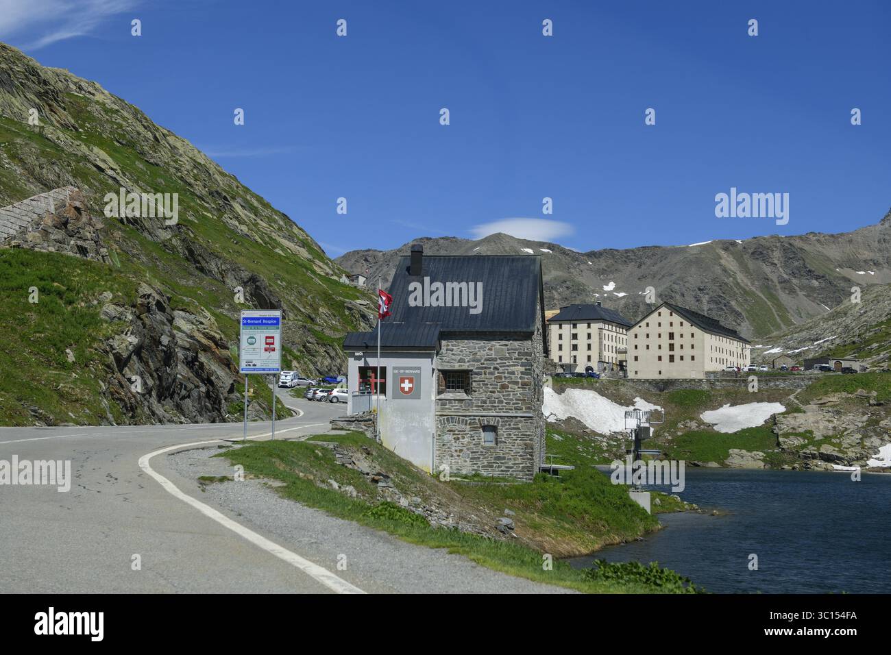 View of historic Swiss border building in the foreground Former passport control checkpoint Passport control Border control Customs control Customs at Stock Photo
