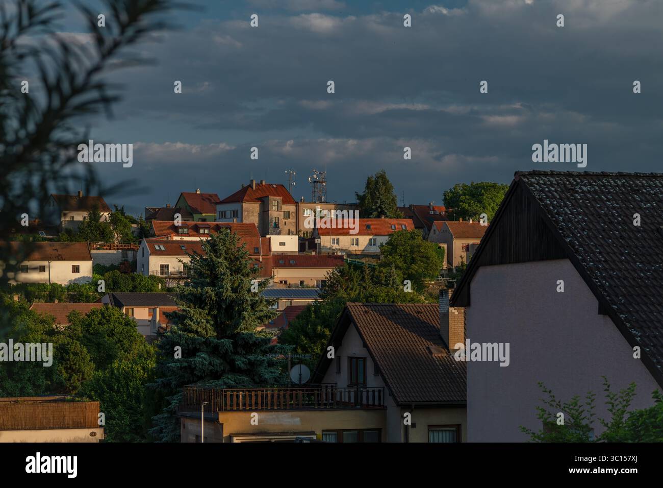 Old houses in central Bohemia town with sunset color in Bustehrad town CZ 07 18 2025 Stock Photo