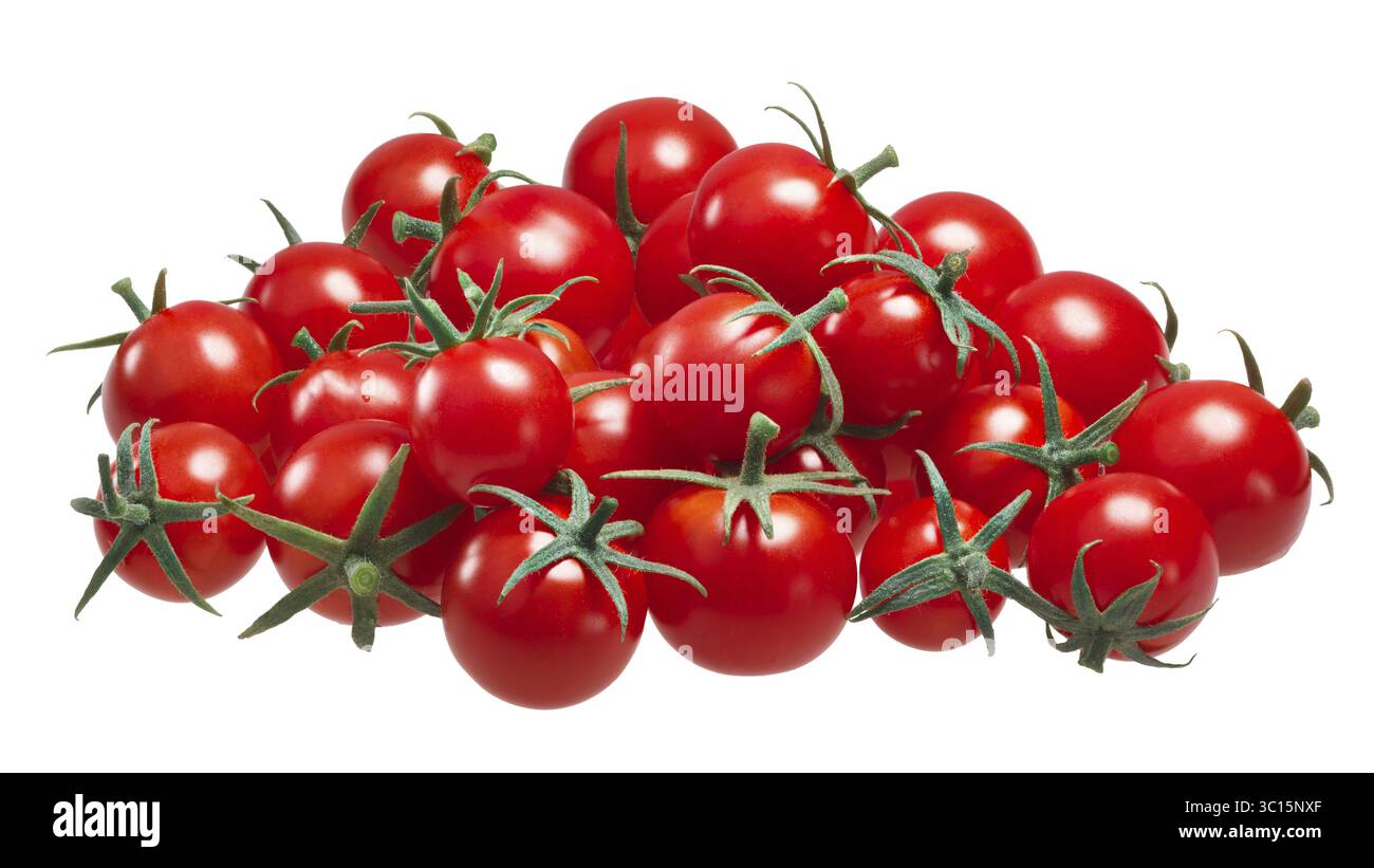 Pile of ripe small cherry tomatoes (ciliegini, pachino, cocktail) with ...