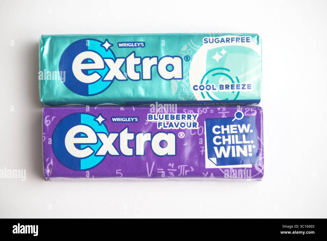 London, United Kingdom, 21st July 2025 :- A view of  packets of Wrigley's Extra Cool Breeze and Blueberry  Chewing Gum, Against A White Background Stock Photo