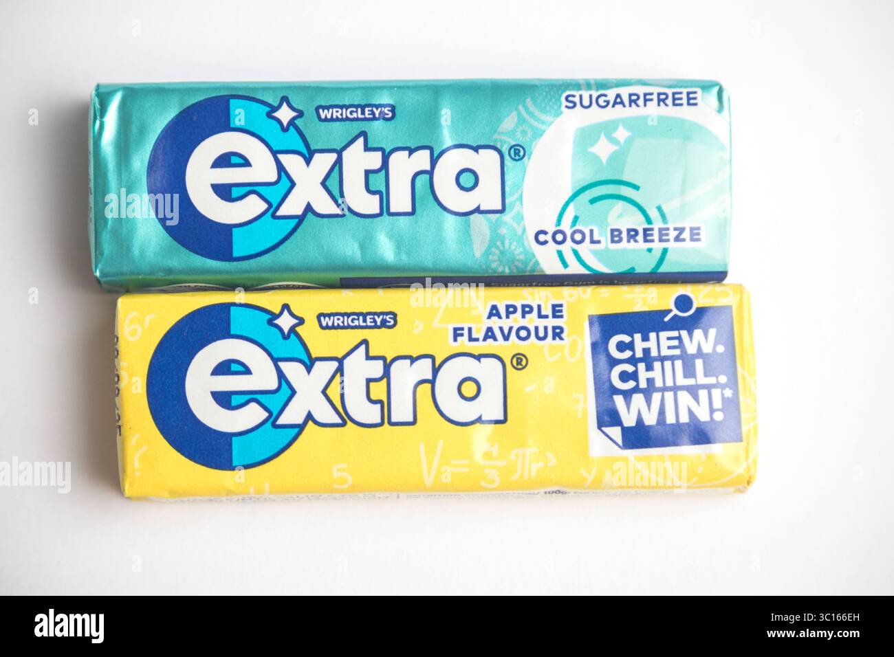 London, United Kingdom, 21st July 2025 :- A view of  packets of Wrigley's Extra Cool Breeze and Apple Chewing Gum, Against A White Background Stock Photo