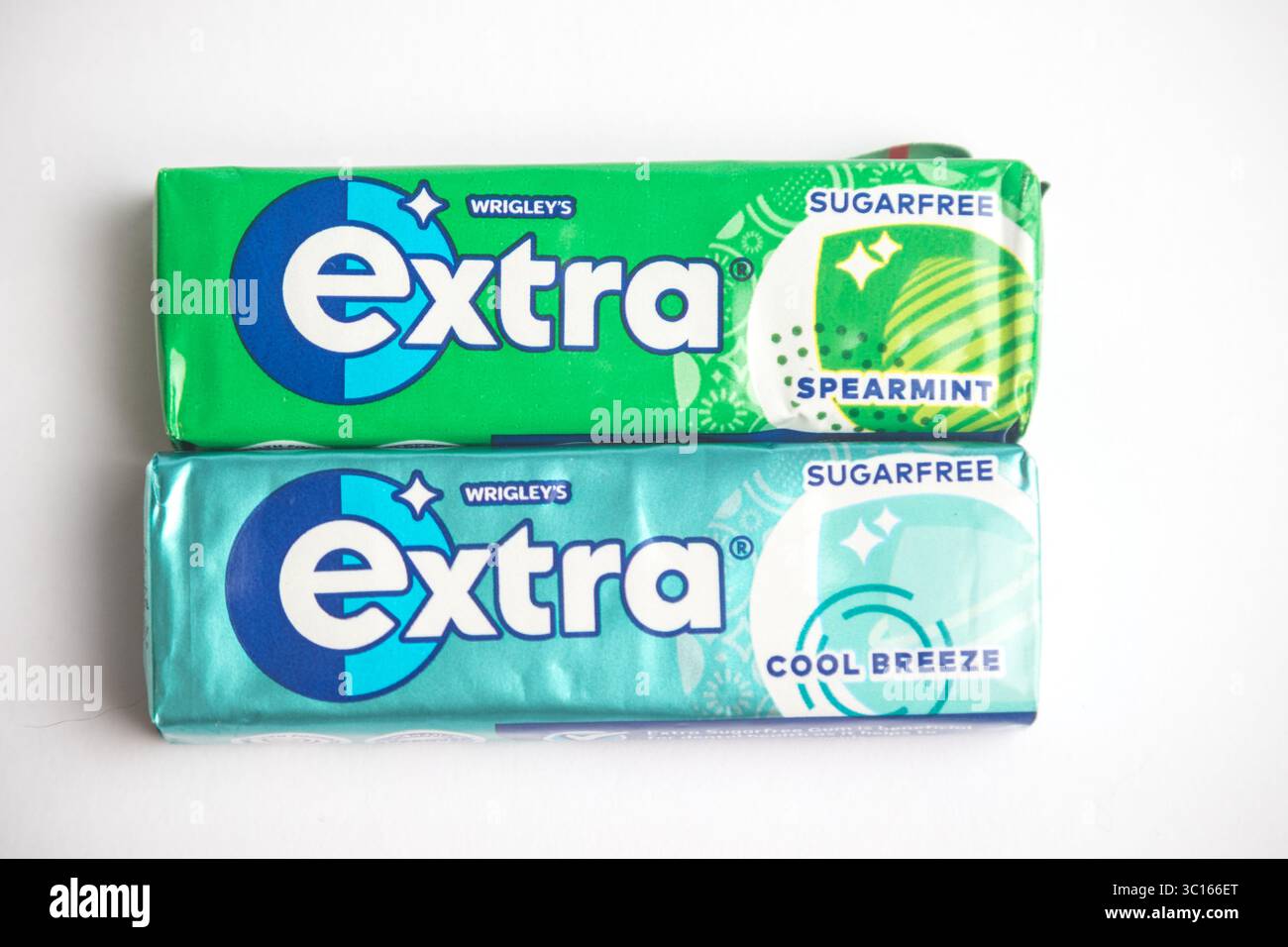 London, United Kingdom, 21st July 2025 :- A view of  packets of Wrigley's Extra Spearmint and Cool Breeze Chewing Gum, Against A White Background Stock Photo