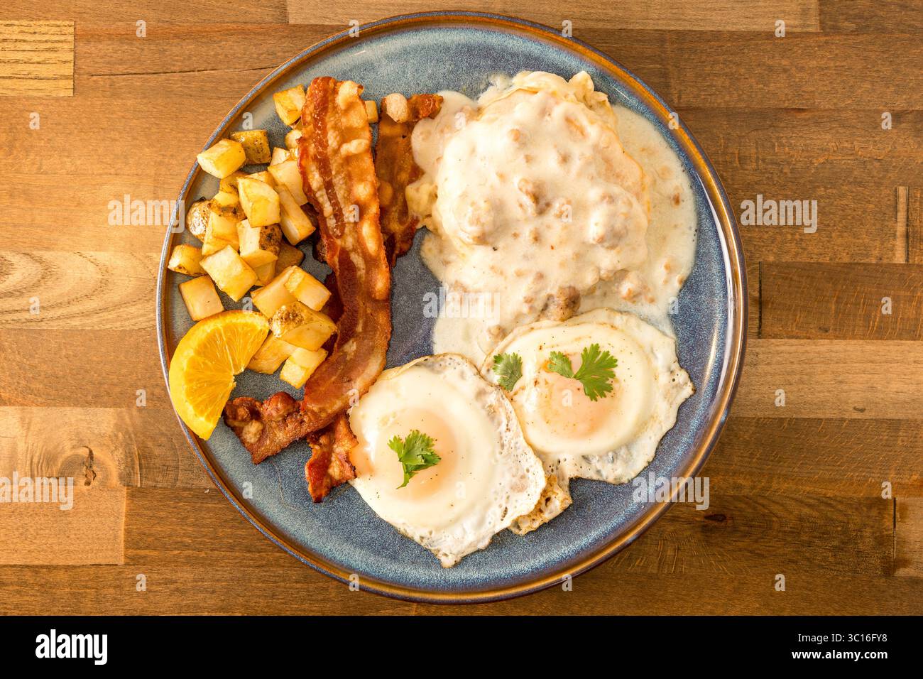 Sausage gravy, eggs and bacon Stock Photo