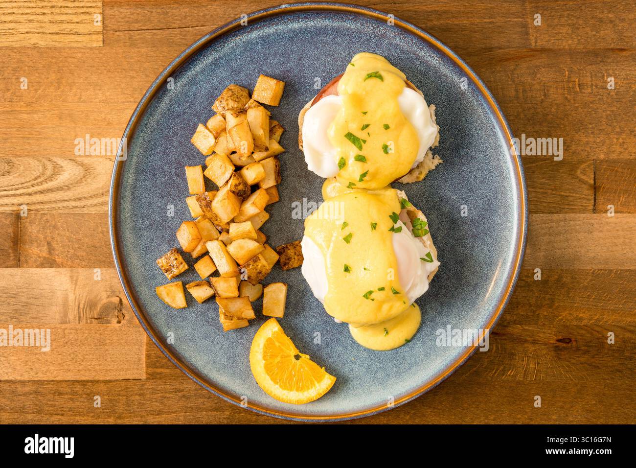 Eggs Benedict on a plate Stock Photo