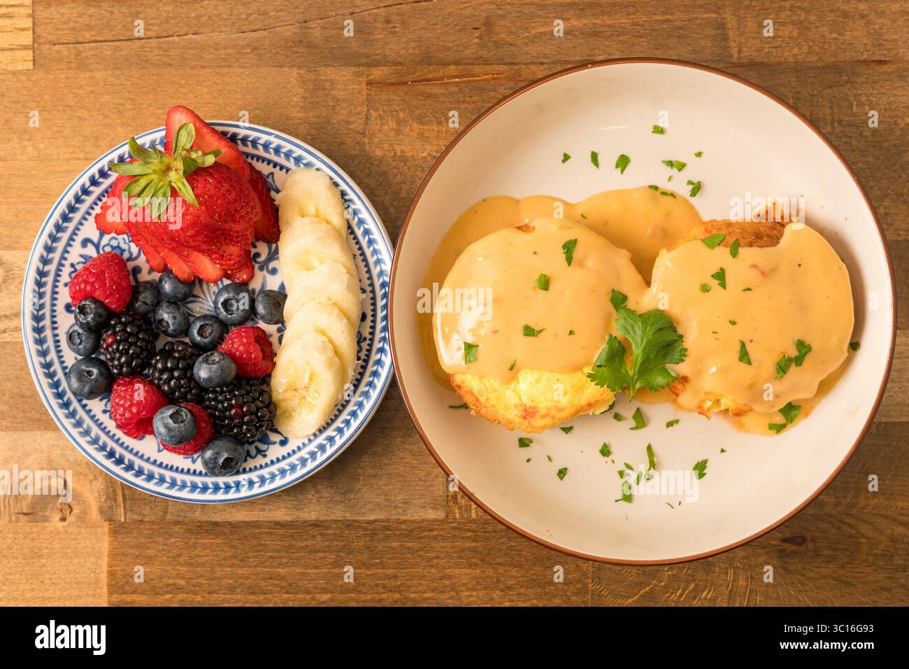 Eggs Benedict on a plate Stock Photo