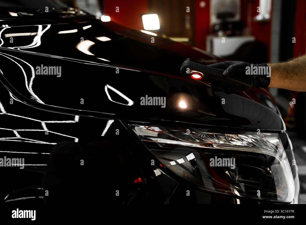 Car paint inspection using detailing inspection light before polishing ...