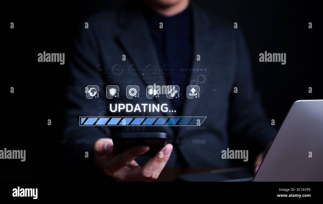 Update software application upgrade technology concept. Man using smart phone, Software update or Operating system, updating progress bar, Install app Stock Photo