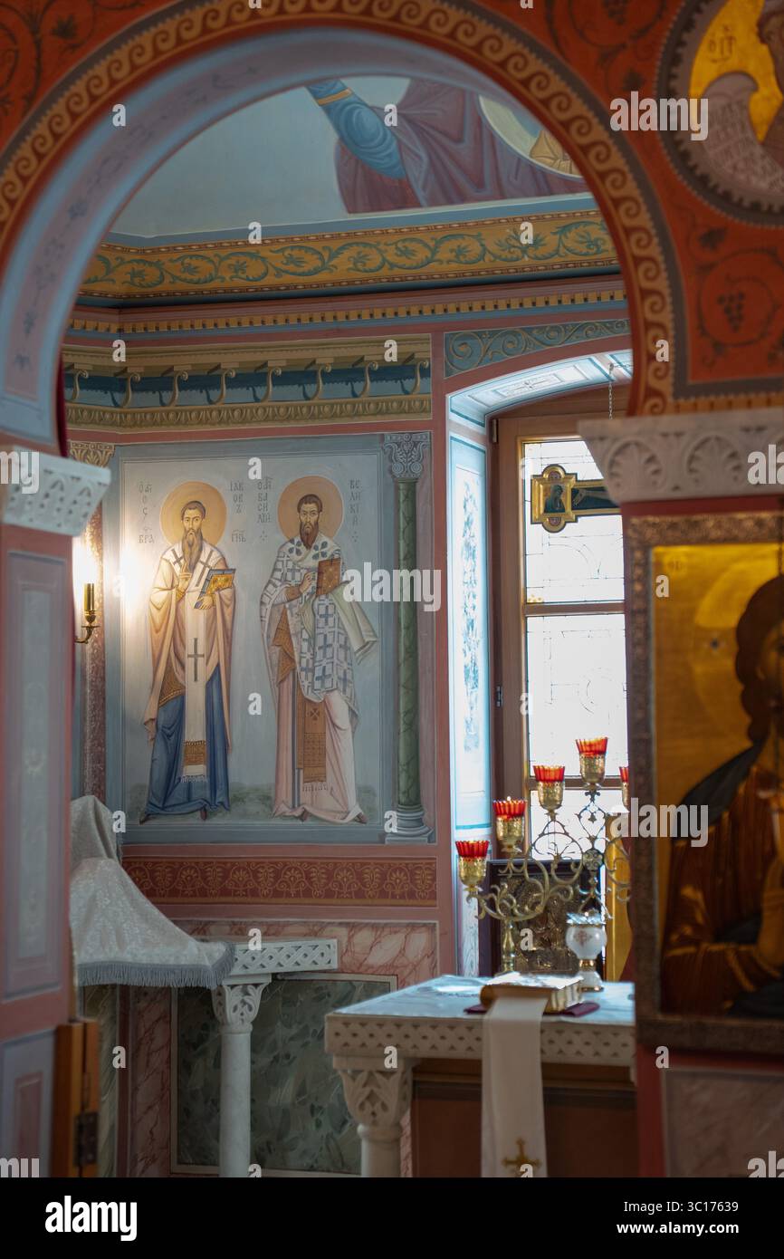 Interior of an Eastern Orthodox church with vivid iconography, frescoes ...