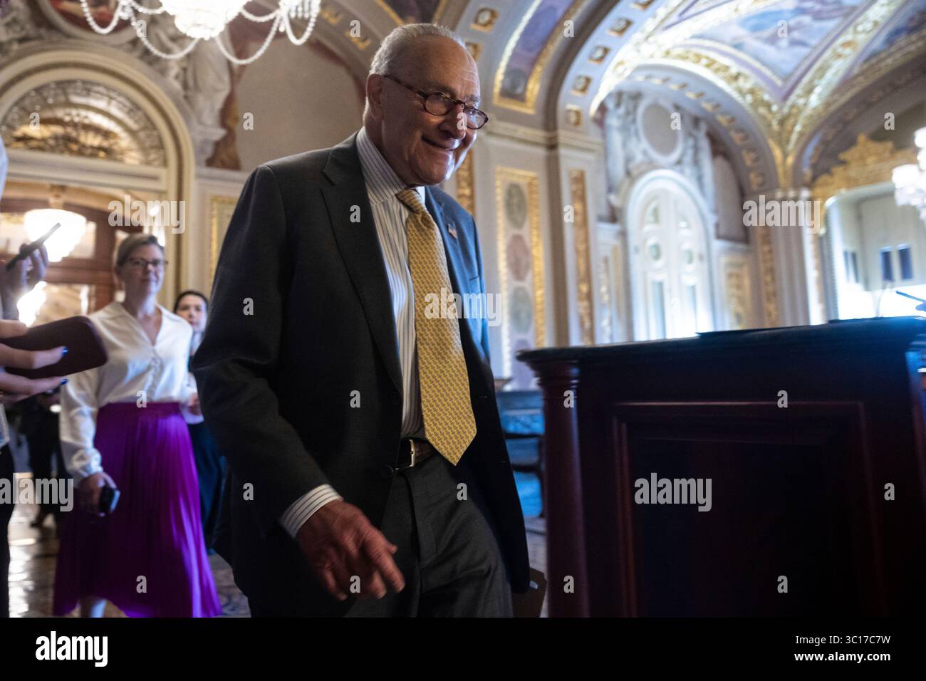 Senate Minority Leader Chuck Schumer (D-N.Y.) walks to a Senate ...