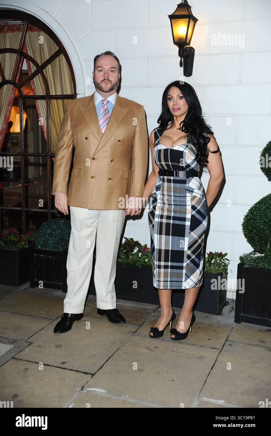 February 5, 2019 - London, United Kingdom - Jonathan Sothcott and Janine Narissa attends the Ray Burmiston fundraising exhibition at The Athenaeum Hotel in London. (Credit Image: © Terry Scott/SOPA Images via ZUMA Wire) Stock Photo