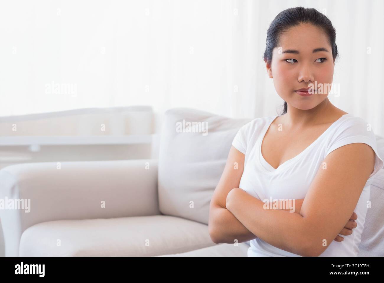 Korean woman crossing arms hi-res stock photography and images - Alamy