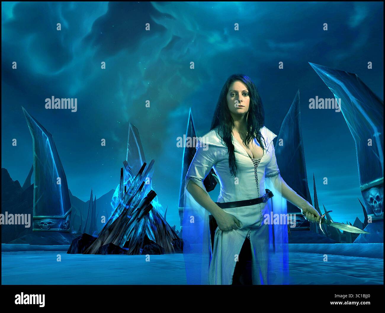 March 30, 2012 - Minneapolis, MN, U.S. - This Is and Illustration for the woman who play video games. Jeanna McMahon becomes part of the Warcraft game [   Assignments #20022478A  March 28, 2011  SLUG: girlgamers04xx  EXTRA INFORMATION: Video screen is from the warcraft Game red screen, Human death knight begins his journey in Blasted blue screen, Lands, Female caster in Icecrown Glacier. (Credit Image: Tom Wallace/Minneapolis Star Tribune/TNS via ZUMA Wire) Stock Photo
