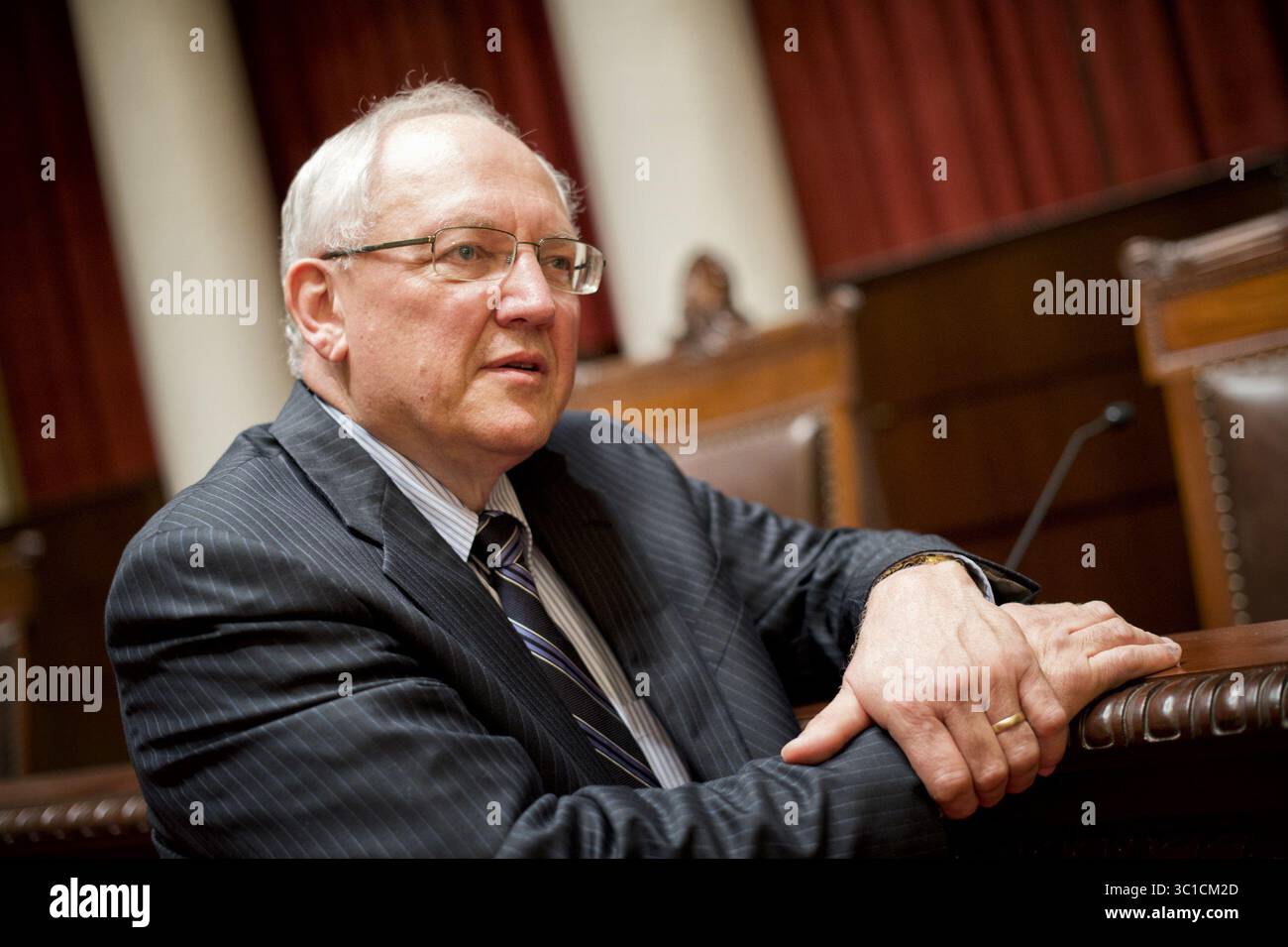 May 30, 2013 - St. Paul, Minnesota, USA - Retiring Supreme Court Justice Paul Anderson came to the Supreme Court chambers in the Capitol to have his portrait taken but couldn't resist talking to this group of school kids from Forest Lake on the importance of the legislative branch of government. He asked if they thought he was perfect and got a resounding ''no'' and said thats why we need seven justices on the court, because each brings a different point of view. Thursday, May 30, 2013 (Credit Image: Glen Stubbe/Minneapolis Star Tribune/TNS via ZUMA Wire) Stock Photo