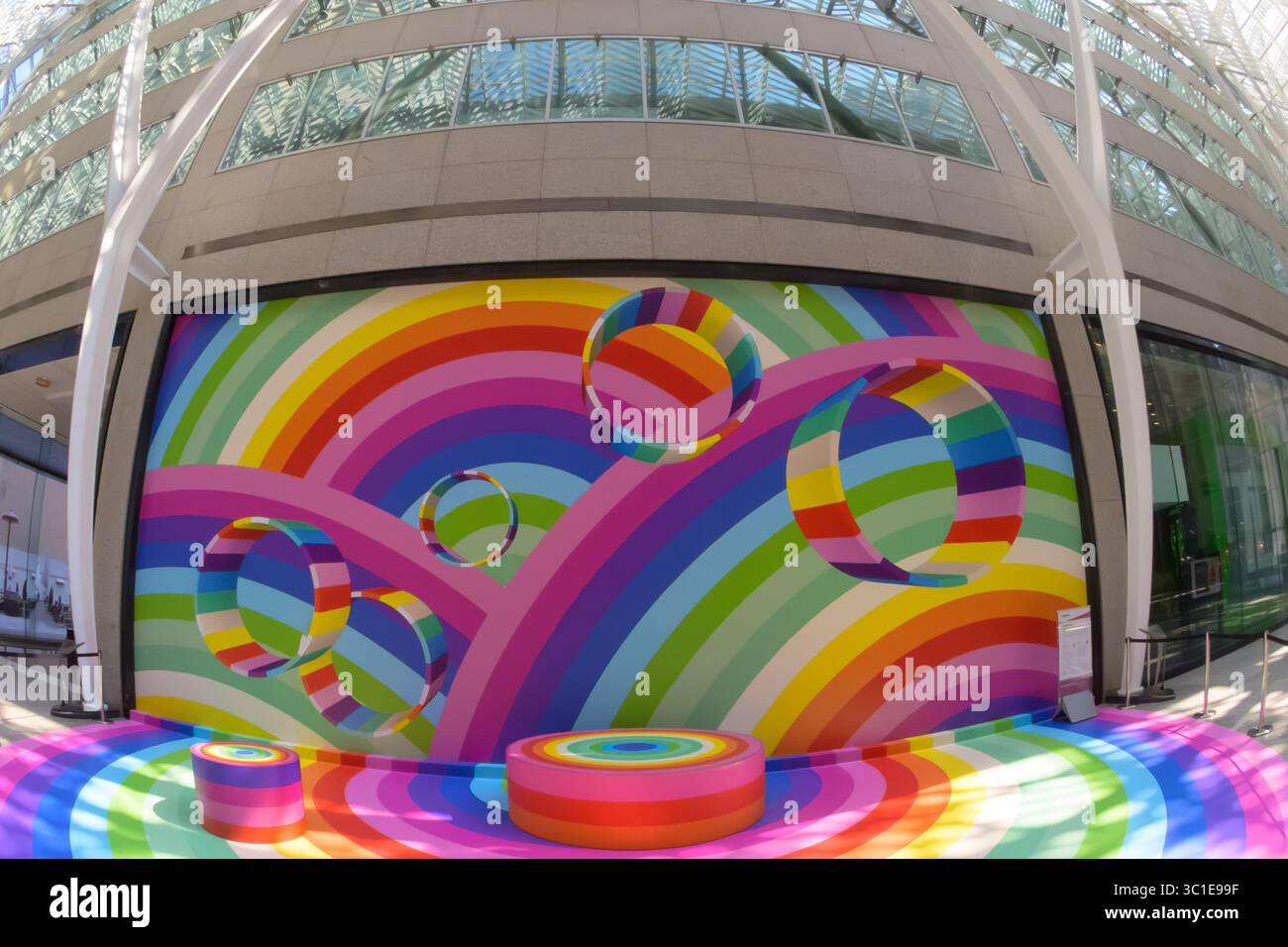 Colorful rainbow mural with circular shapes, Pride Month Art in the Allen Lambert Galleria Stock Photo