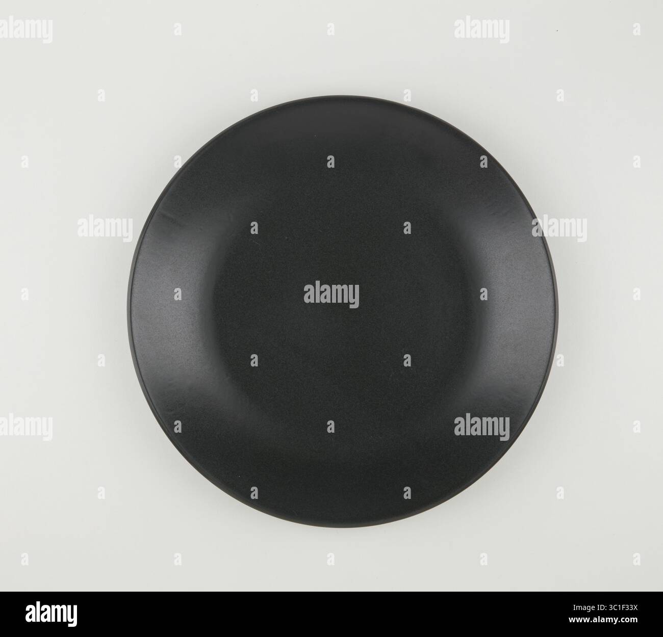 Matte black ceramic cup bottom isolated nature background with clipping path Stock Photo