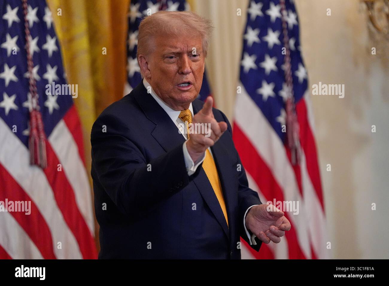 President Donald Trump gestures during a reception for Republican ...