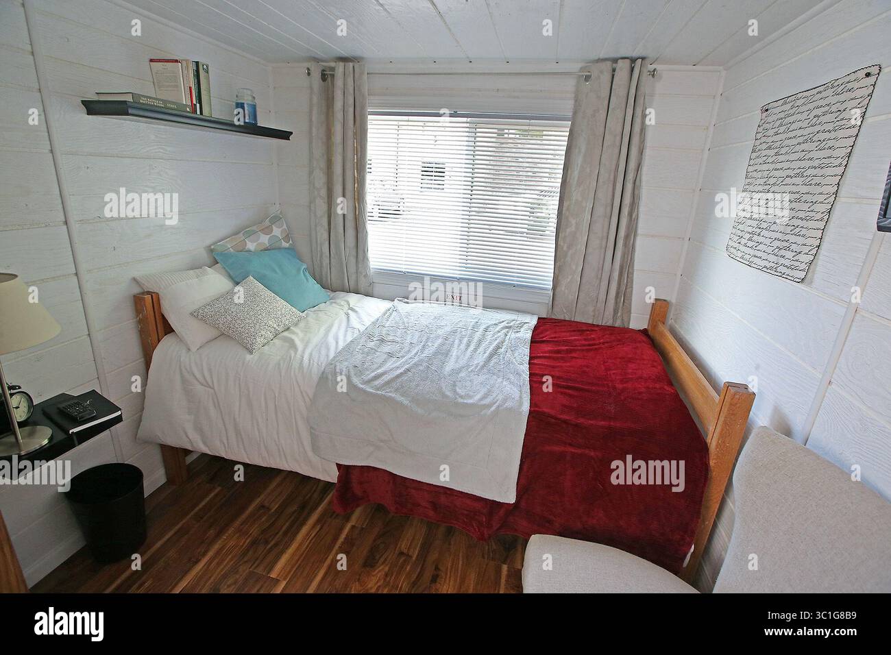 May 17, 2016 - New Brighton, MN, U.S. - John Louiselle, left, and Jesse Lammi are a pair of young New Brighton entrepreneurs that have started NextDoor Housing, a company that produces tiny houses with a twist. The handicapped-accessible houses are really more like trailers and aimed at adults recovering from an illness or who are disabled. The two helped draft a bill changing zoning laws so the houses would be welcome more places, regardless of zoning laws. It passed last week. (/STAR TRIBUNE) (Credit Image: Elizabeth Flores/Minneapolis Star Tribune/TNS via ZUMA Wire) Stock Photo