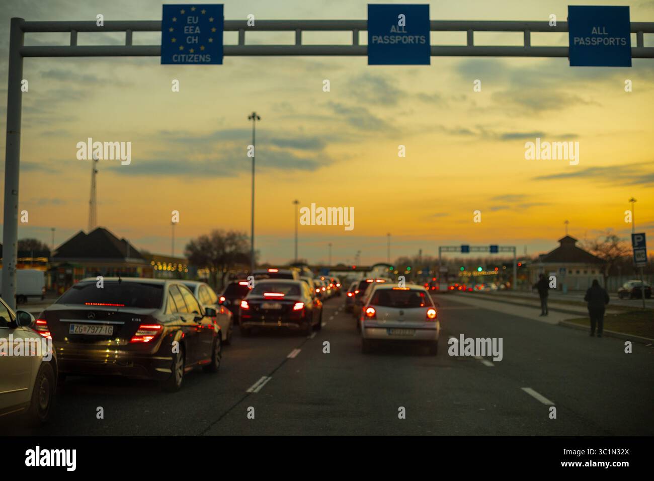 Horgos Roszke, Hungary - February 17, 2025: Long Queue of Pasengers Cars Stuck at EU Border Entrance between Serbia and Hungary, Horgos, Roszke Stock Photo