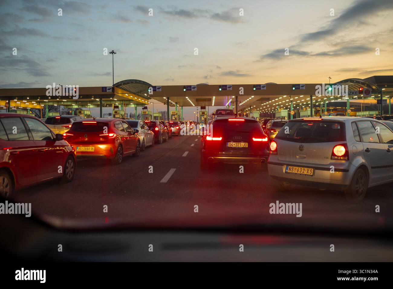 Horgos Roszke, Hungary - February 17, 2025: Long Queue of Pasengers Cars Stuck at EU Border Entrance between Serbia and Hungary, Horgos, Roszke Stock Photo