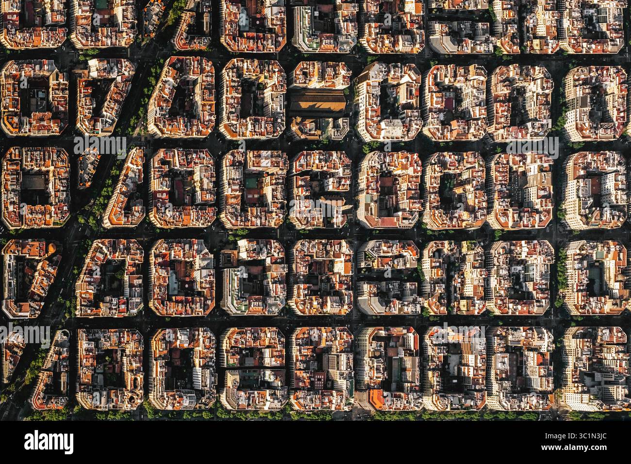 Aerial view of typical buildings of Barcelona cityscape from helicopter. top view, Eixample residencial famous urban grid Stock Photo