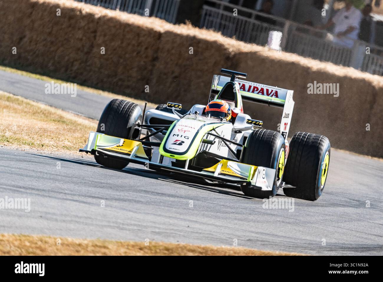 Brawn BGP 001 historic Formula 1 racing car driving up the hillclimb at ...