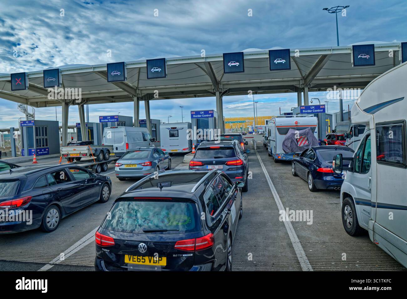 UK Border check at Calais Ferry Port in France. (See Image ID: 3C0F531 for version with obscured licence plates.) Stock Photo