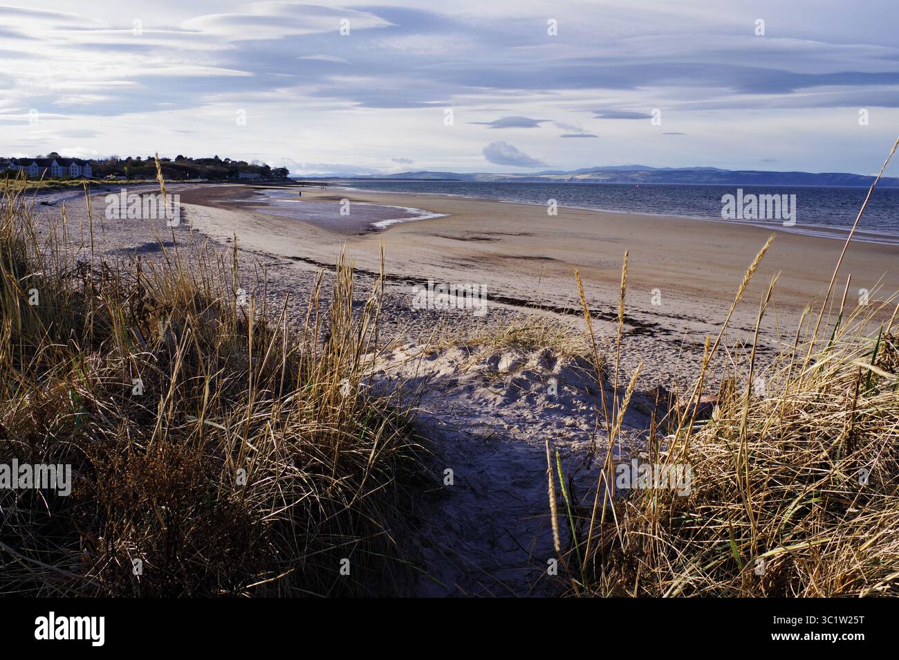 Beautiful quiet beach with very few people, Scotland Stock Photo
