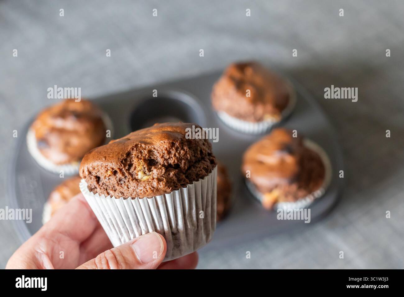A home baked chocolate chunk muffin from a Betty Crocker muffin mix Stock Photo