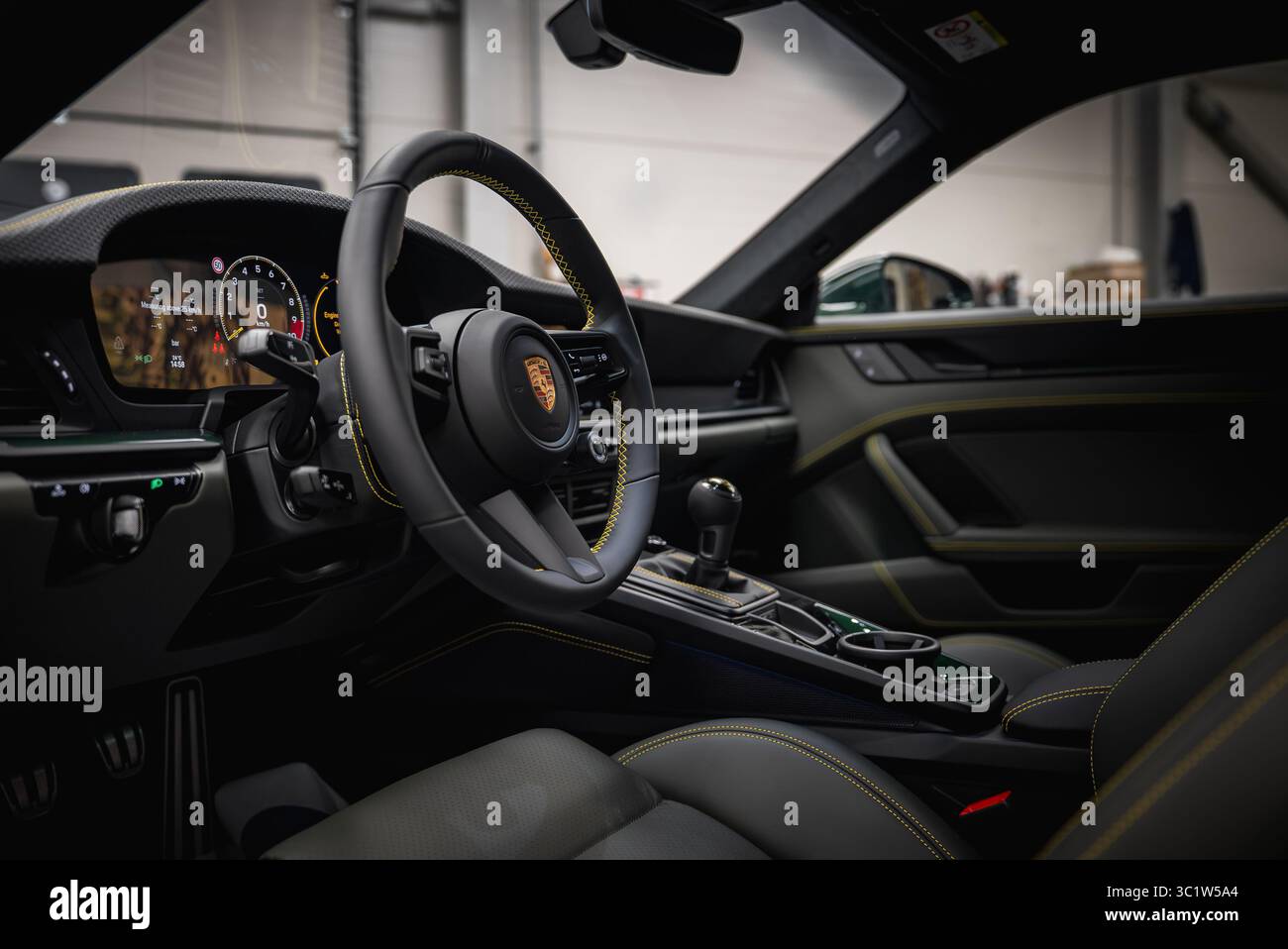 Interior Of Porsche 911 GT3 Touring In A Tuning Garage Setting Stock interior-of-porsche-911-gt3-touring-in-a-tuning-garage-setting-stock