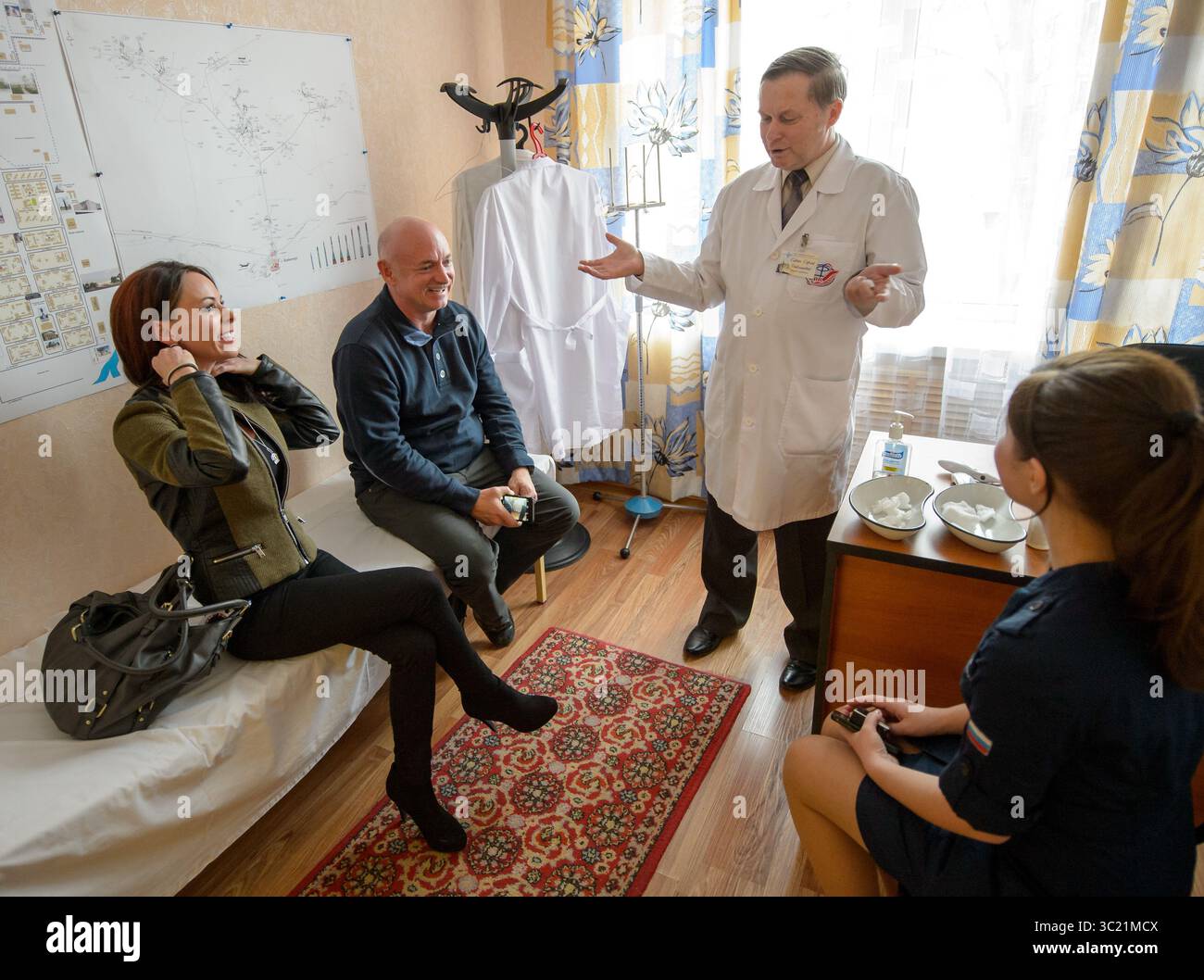 March 26, 2015 - Baikonur, Kazakhstan - Expedition 43 NASA Astronaut Scott Kelly's girlfriend, Amiko Kauderer, and Kelly's twin brother, retired NASA Astronaut Mark Kelly, meet with Gagarin Cosmonaut Training Center (GCTC) Chief Epidemiologist Sergei Savin to be medically cleared to visit with Scott Thursday, March 26, 2015 at the Cosmonaut Hotel in Baikonur, Kazakhstan. Mark Kelly, who flew four space shuttle missions and commanded the final flight of space shuttle Endeavour, will participate in biomedical studies on the ground while his twin is on board the orbiting laboratory. Scott Kelly, Stock Photo