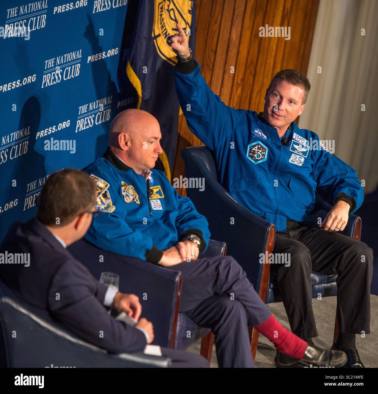 September 14, 2015 - Washington, DC, USA - Astronaut Terry Virts, right, is seen during a discussion with retired Astronaut Mark Kelly, center, National Press Club President John Hughs, and Kelly's twin bother, Scott Kelly who is currently onboard the International Space Station, Monday, Sept. 14, 2015 at the National Press Club in Washington. The discussion is a day before Scott Kelly reaches halfway through his one year in space. (Credit Image: © NASA/ZUMA Wire/ZUMAPRESS.com) Stock Photo