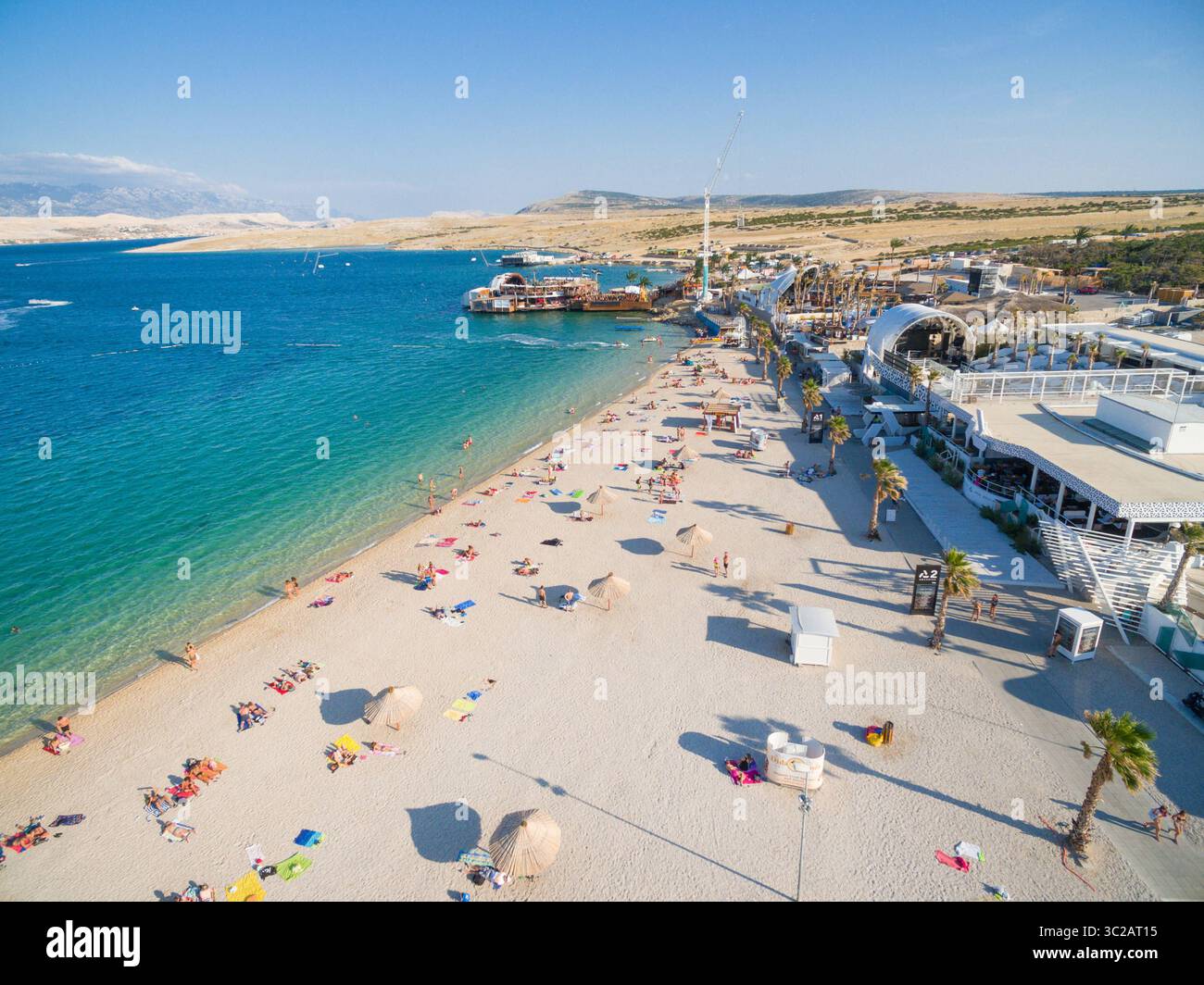 August 30, 2016 - Novalja, Lika-Senj County, Croatia - PAG, CROATIA - AUGUST 30, 2014: Aerial view of beach and clubs at popular Zrce beach (Credit Image: © Amazing Aerial via ZUMA Wire) Stock Photo