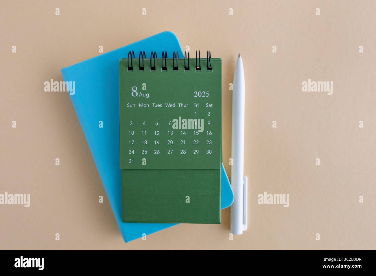 August Notepad Hello, August 2025. Desktop calendar and notepad for writing on the ...