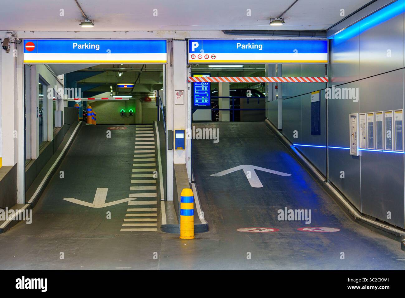 Parking Garage Entrance with Directional Arrows and Signage for Vehicle ...