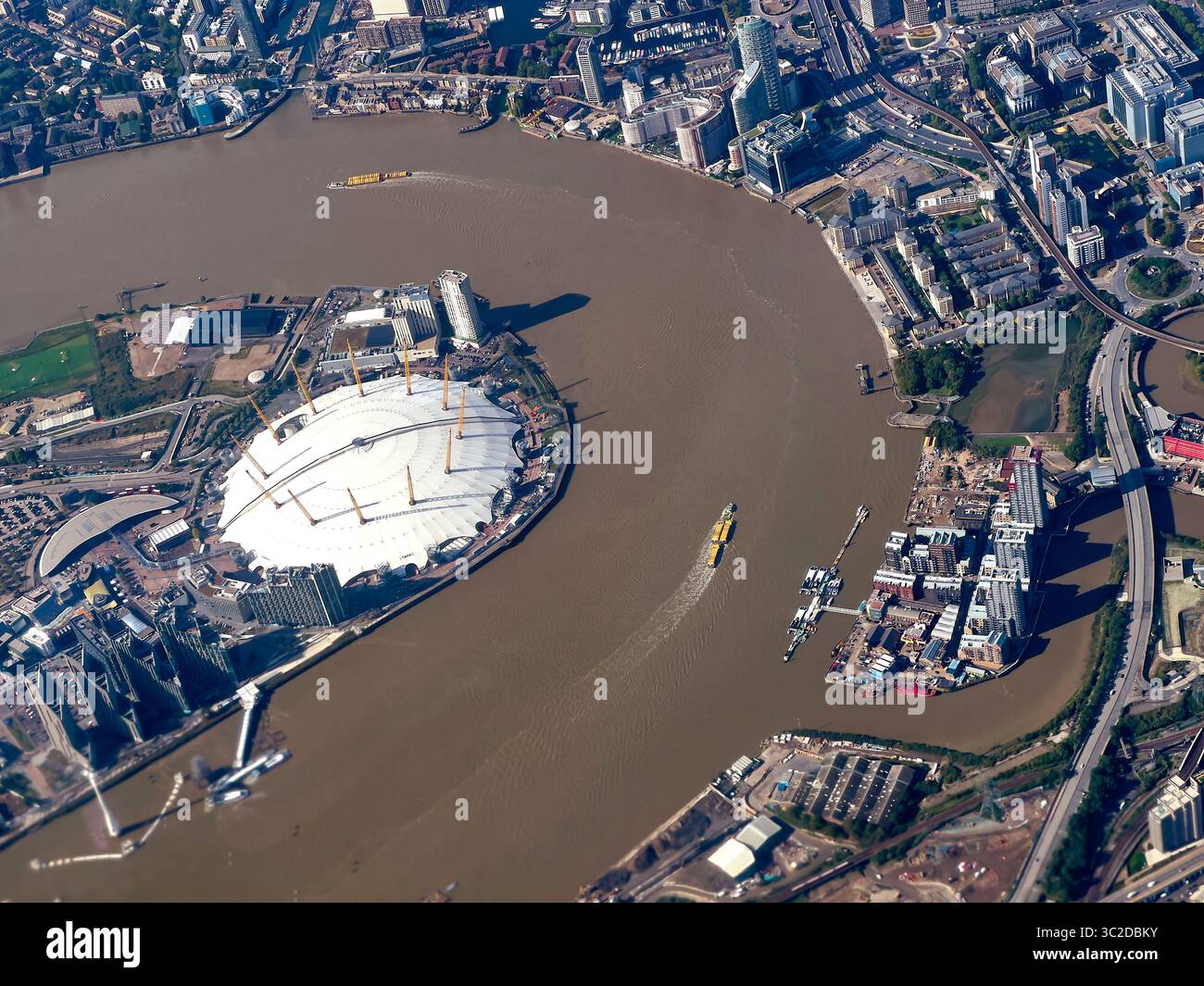 Aerial view of the iconic O2 Arena dome reflecting the sunlight amidst ...
