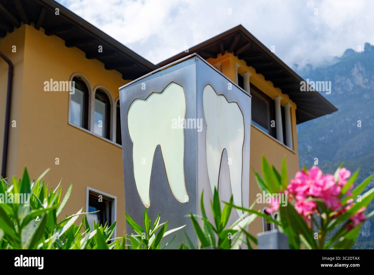 Italian Tooth Riva del Garda, Lake Garda, Italy July 23, 2025: Dental practice with ...