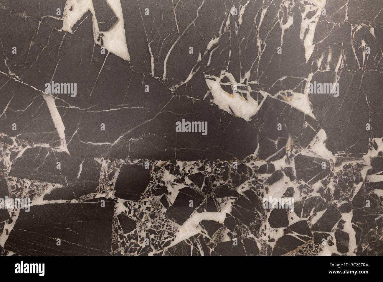 Elegant black and white marble surface displaying unique veining patterns in a modern interior setting Stock Photo
