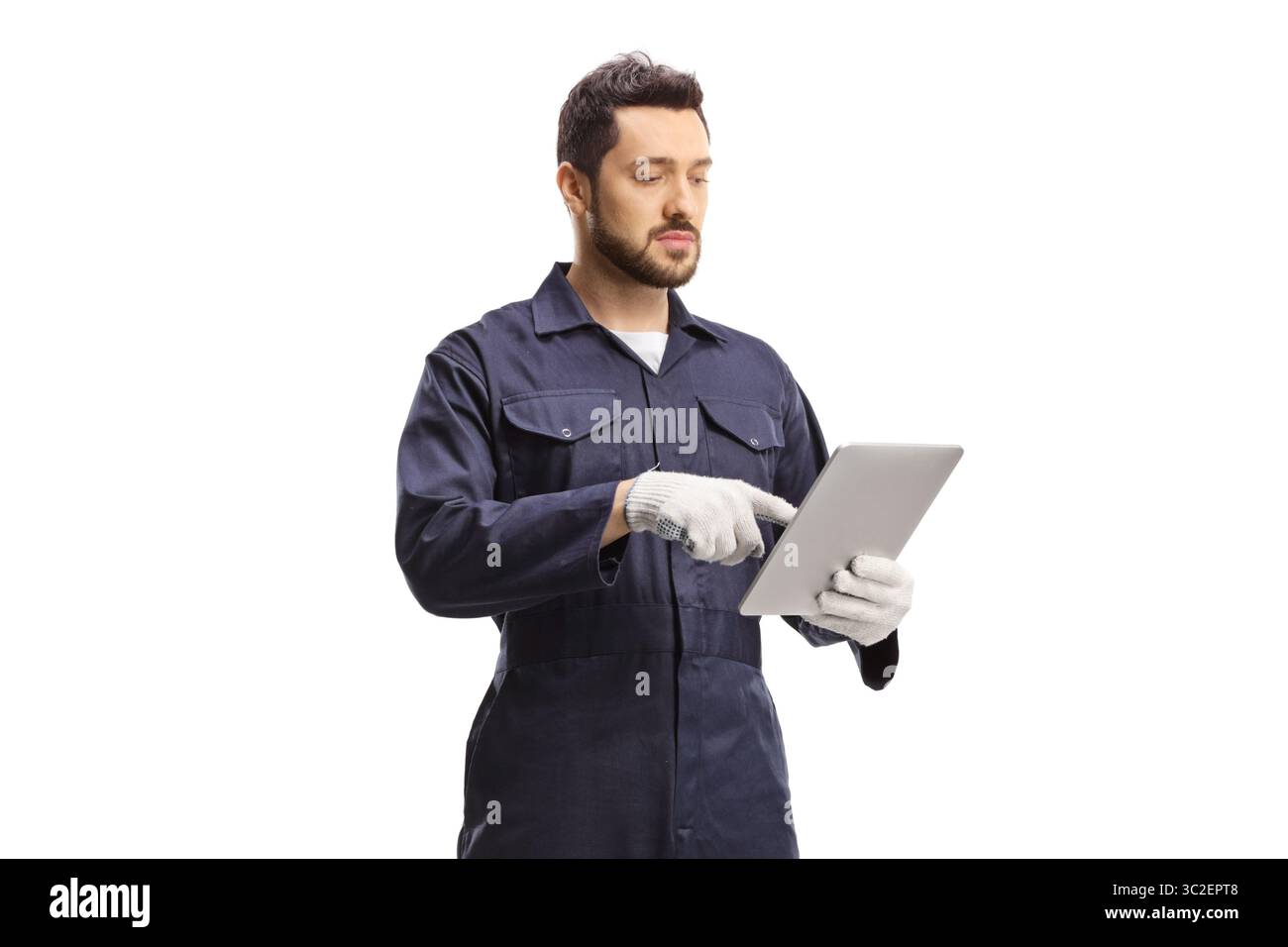 Auto mechanic using a digital tablet isolated on white background Stock Photo