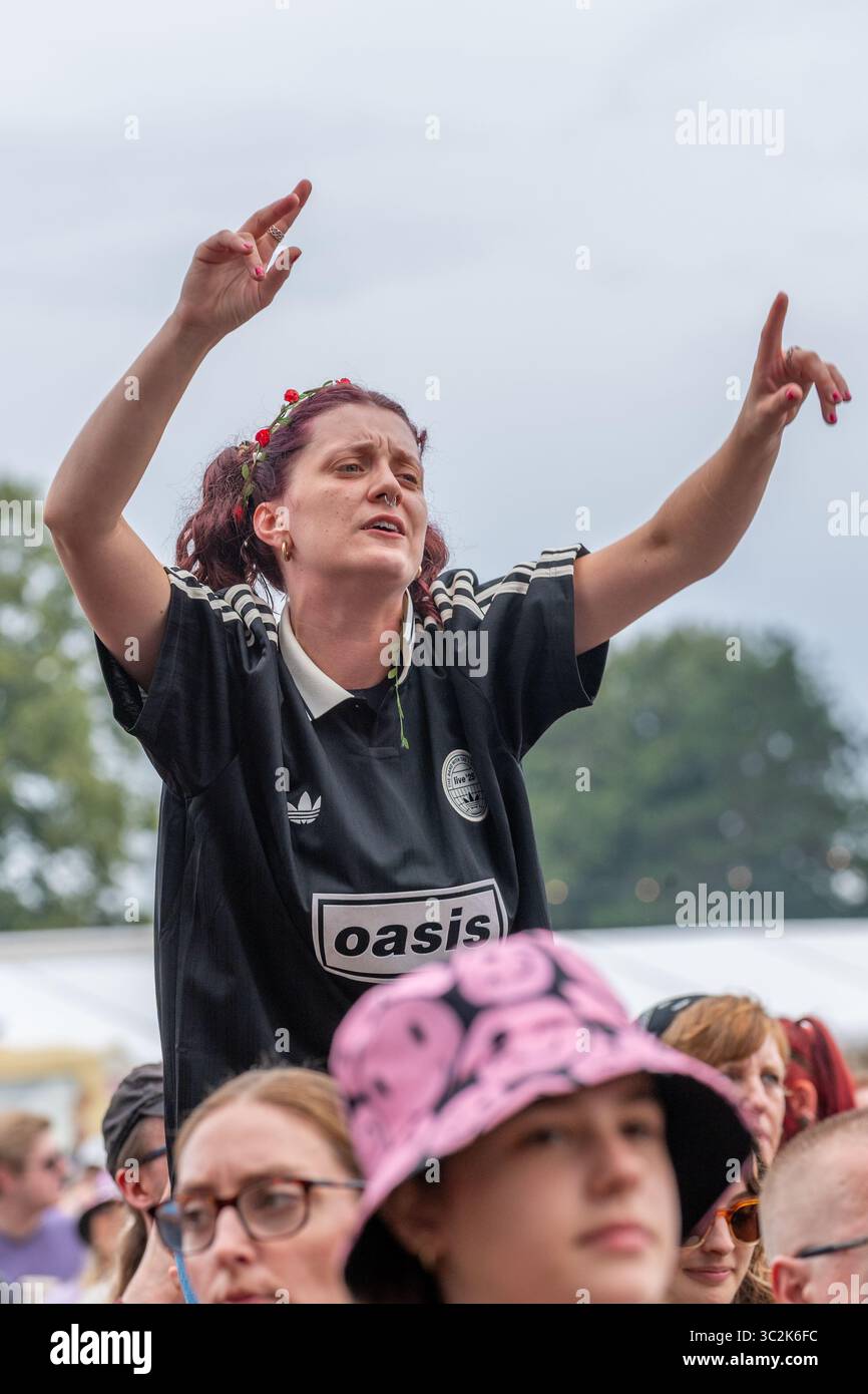 Festival fans enjoying the music at the Splendour Music Festival set the the historic grounds of Wollaton Hall on the out skirts of Nottingham. Stock Photo