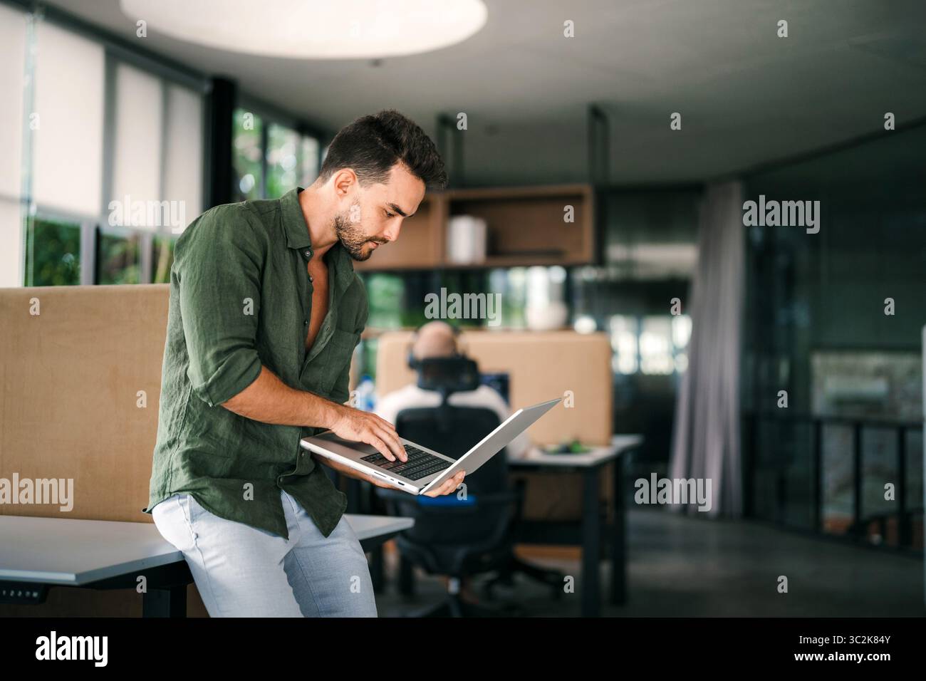 Software engineer using laptop computer with global network connection, Technology, innovation Stock Photo