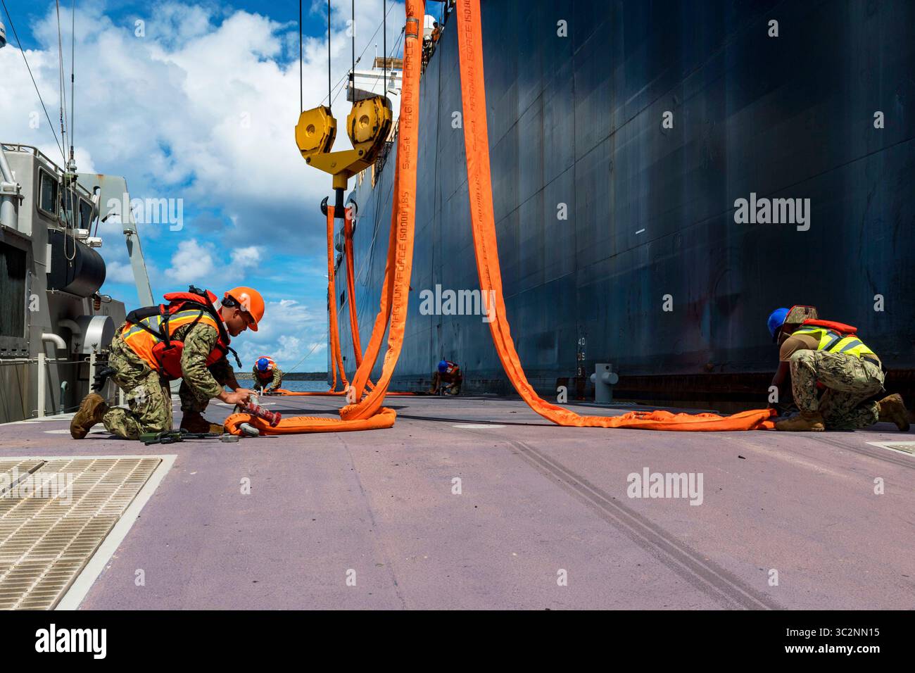 July 10, 2019 - Santa Rita, Guam - Sailors assigned to Navy Cargo ...